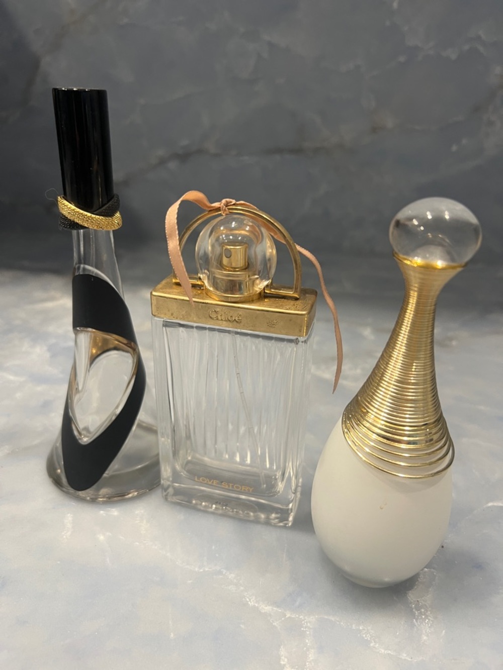 3 empty perfume bottles
Chloé Love Story Eau de Parfum (EMPTY)
Jadore & RIHANNA